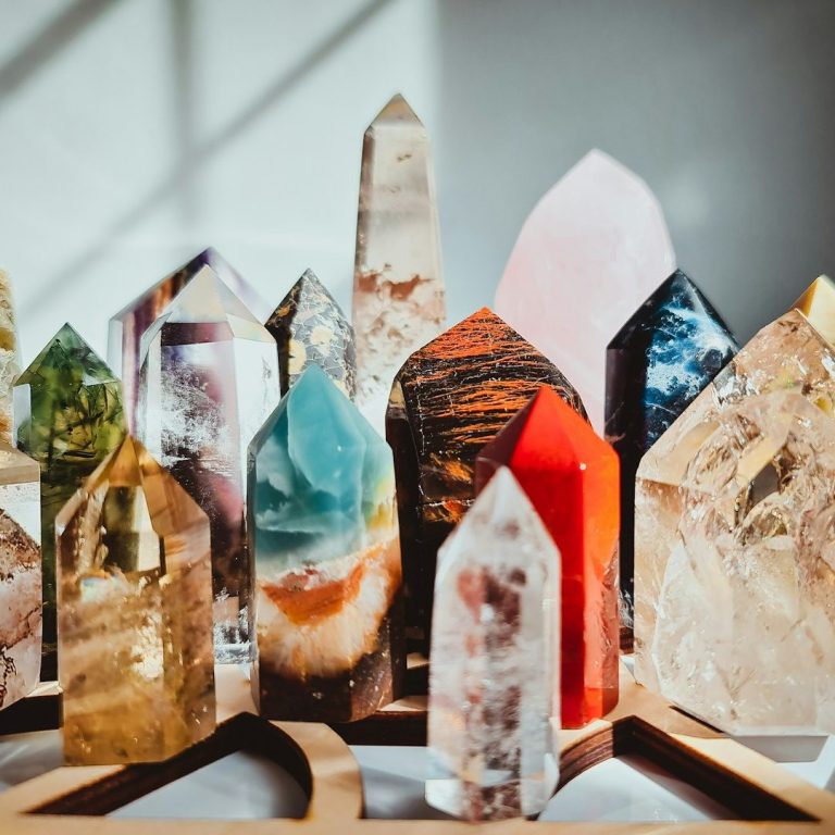 A collection of various gemstones and crystals in different shapes and colours.